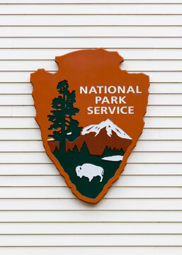 National Parks Services Sign On White Exterior Wall