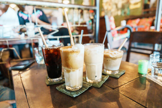 Delicious Ice Blended Coconut Coffee And Americano Black Coffee  In The Cafe. Famous Drink In Vietnam