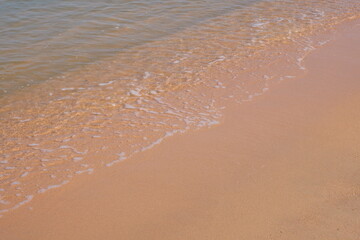 bstract sand of beach and soft wave background