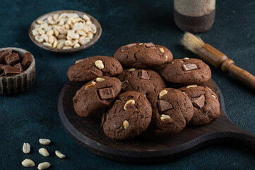 Fresh homemade chocolate chip cookies. Brownie cookies. Cookies with chocolate and nuts. Vegetarian dessert. American dessert