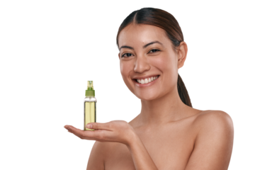 PNG Shot of a beautiful young woman holding up a bottle of face mist