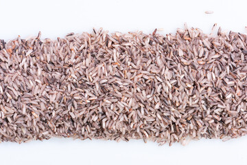 Thai Riceberry rice : Close-up pile of rice called riceberry rice , rice with high nutrients  on white background.
