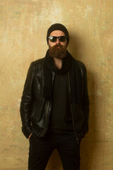Brutal man, serious face of handsome male model, concept of men power and strong. Fashion male...