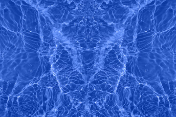 Defocus blurred transparent blue colored clear calm water surface texture with splashes and bubbles. Trendy abstract nature background. Water waves in sunlight with copy space. Blue watercolor shining