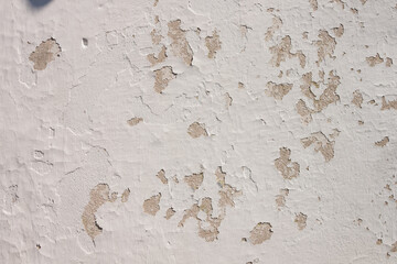 The texture of a plastered white wall. Close-up. Background