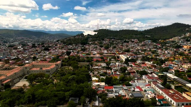 side view of the city of Oaxaca, the temple of Santo domingo and the guelaguetza