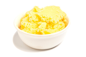 Ghee in bowl isolated on white background