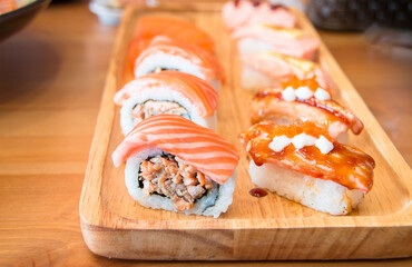 Sushi set, California Sushi roll set with salmon, Japanese food styles, rice roll with Salmon, Japanese food in Restaurants