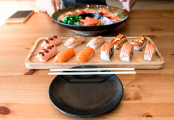 Sushi Japanese food in Restaurants, California Sushi roll set with salmon, Japanese food styles, rice roll with Salmon.