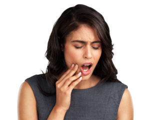 PNG Cropped shot of a young woman suffering from a toothache while standing against a grey backgroundI need to see my dentist about this toothache