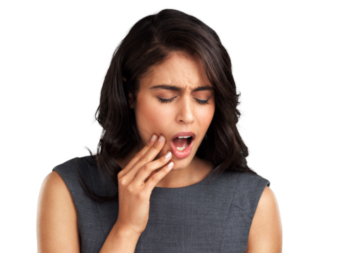 PNG Cropped shot of a young woman suffering from a toothache while standing against a grey backgroundI need to see my dentist about this toothache