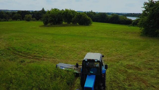 tractor belarus on the summer field. High quality FullHD footage
