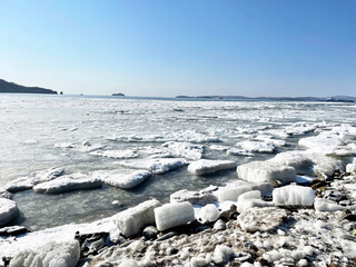Blocks of ice off the coast of Patroclus (Patrokl) Bay at the end of winter. Russia, Vladivostok...