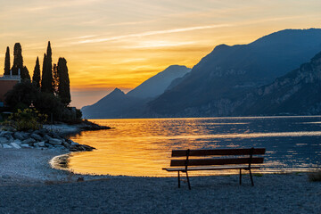 Lake Garda (Lago di Garda) and Italian Alps view from the small village of Malcesine at sunset,...