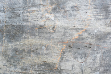 Distressed old concrete wall with cracks and mildew grunge background and wallpaper texture
