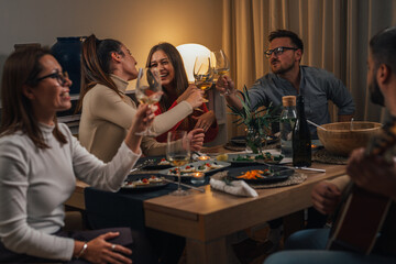 Friends toast because of the good atmosphere