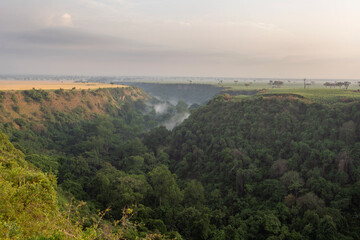 Naklejka premium Kyambura Gorge are in the Uganda. Valley in Africa. Rain forest in the valley. 