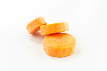 raw carrot slices isolated on white background