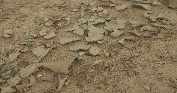 Arid Soil Ground With Broken Pieces Of Mud On The Surface. High Angle 