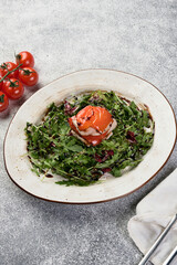 grilled salad with turkey on a light gray menu background
