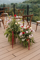Fototapeta premium Beautiful bouquets and flower combinations for aisle decoration and special events like wedding ceremony and reception.