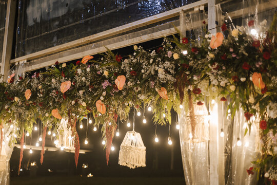 Beautiful Detail Combination Of Flower Decoration At Night At Wedding Reception.