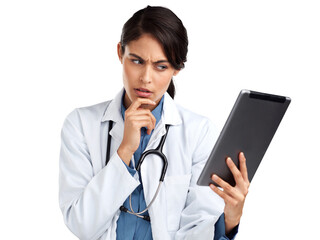 PNG Studio shot of a young doctor using a digital tablet and looking unsure an isolated transparent png background.