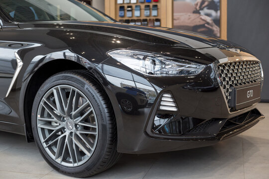 Russia, Izhevsk - October 16, 2019: New modern car Genesis G70 in the Hyundai showroom. Cropped image.