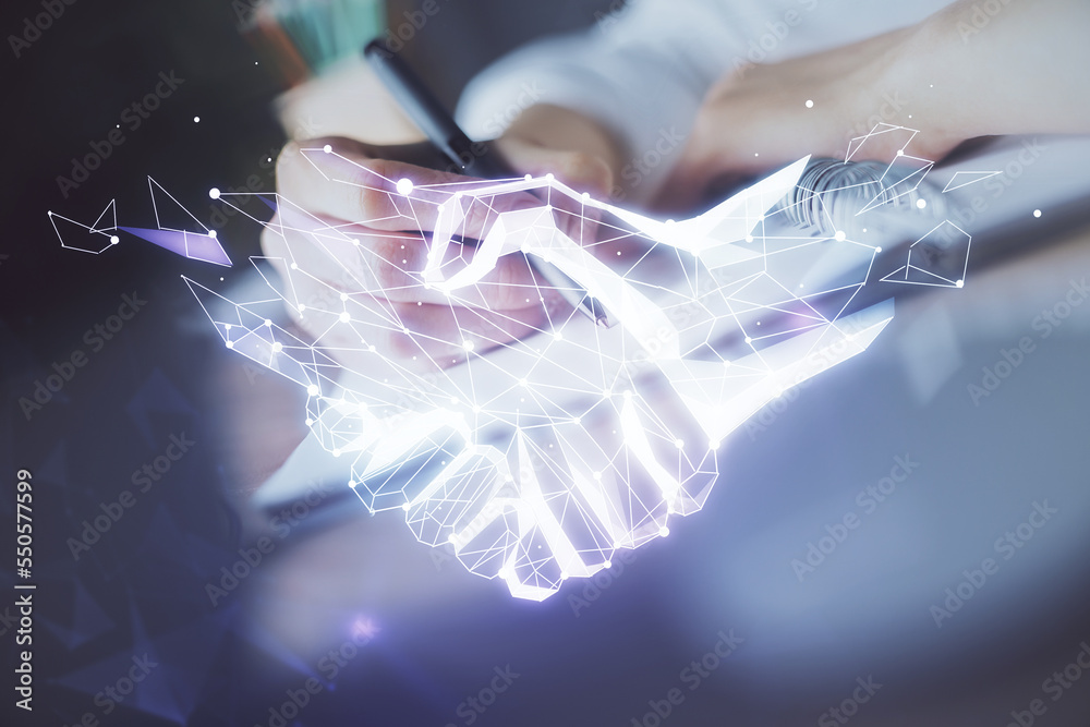 Poster handshake drawing over hands taking notes background. concept of success. double exposure
