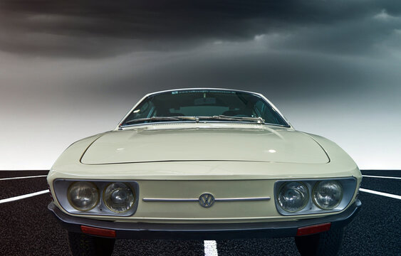 Volkswagen SP2 sports car built and sold in small numbers in Brazil in the 1970s, composite on asphalt against gray sky, location Wolfsburg, Germany, October 19, 2022