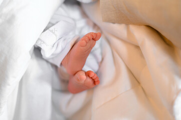 The sacrament of baptism of an infant in the church.