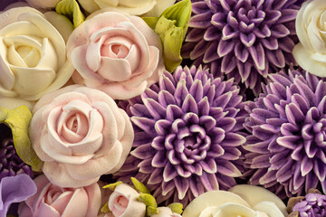 Zephyr bouquet of flowers in a gift box on a light background. Zephyr with a minimum amount of sugar. a natural product.