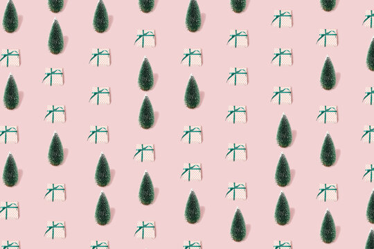 Seamless pattern made of Christmas tree and gift box. Creative New Year present concept. 