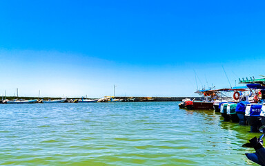 Fototapeta premium Panorama landscape boats port harbor ferries Puerto de Chiquilá Mexico.
