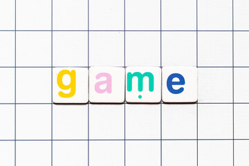 Colorful tile letter in word game on white grid background