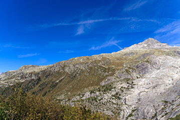 Fototapeta premium View of famous Rhone Glacier with Rhone River in the Swiss Alps with glacier river on a sunny late summer day. Photo taken September 12th, 2022, Furka Pass, Switzerland.