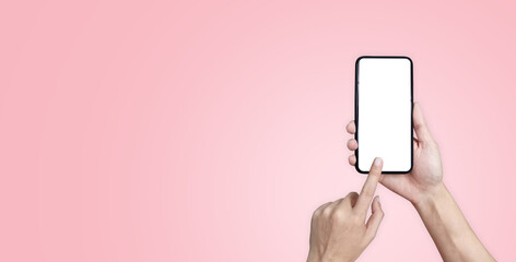 hand and phone on pink background