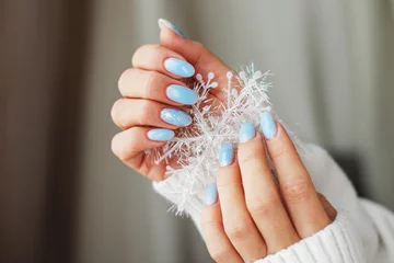 Foto op Canvas Cozy nails with winter manicure with snowflakes © stopabox