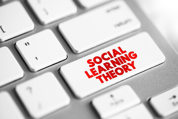 Social learning theory - learning process and social behavior which proposes that new behaviors can be acquired by observing and imitating others, text concept button on keyboard