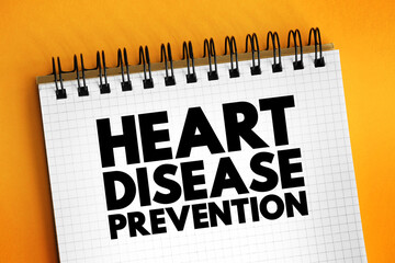 Heart Disease Prevention text concept on notepad for presentations and reports