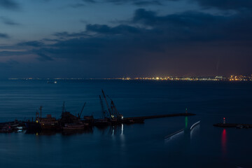 Fishing boats in Iskenderun harbor at dusk.
