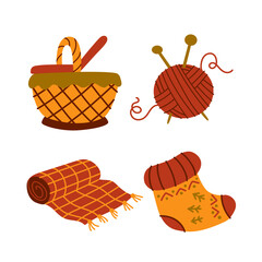 Cozy warm collection. A ball of thread for knitting, a plaid, a basket, a sock. Home comfort. Vector cartoon isolated on white background.