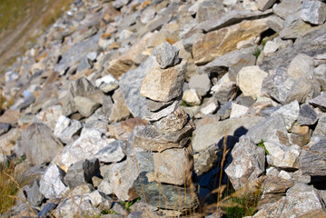 Scenic view of famous Swiss mountain pass Furkapass with rocks and mountain peak on a sunny late summer day. Photo taken September 12th, 2022, Furka Pass, Switzerland.