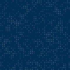 Abstract seamless geometric pattern. Mosaic background of white triangles. Evenly spaced small shapes of different color. Vector illustration on dark blue background