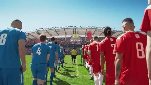 Football Championship Match, Crowds Of Fans Cheer: Two Professional Soccer Teams Enter Stadium Where They Will Compete For Champion Status. Start Of The Major League International Cup Tournament