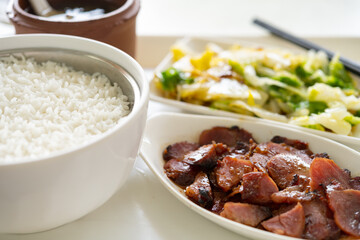 side view BBQ pork and vegetable and soup and bowl of rice horizontal composition