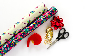 Gift-wrapping paper, scissors, sticky tape and decorations