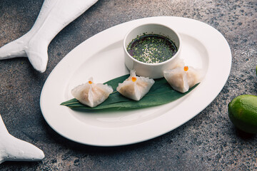 Dim sum with shrimp and soy sauce