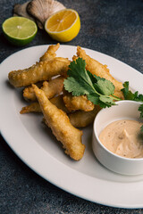 Fish in batter with sauce