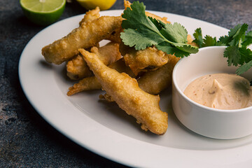 Fish in batter with sauce